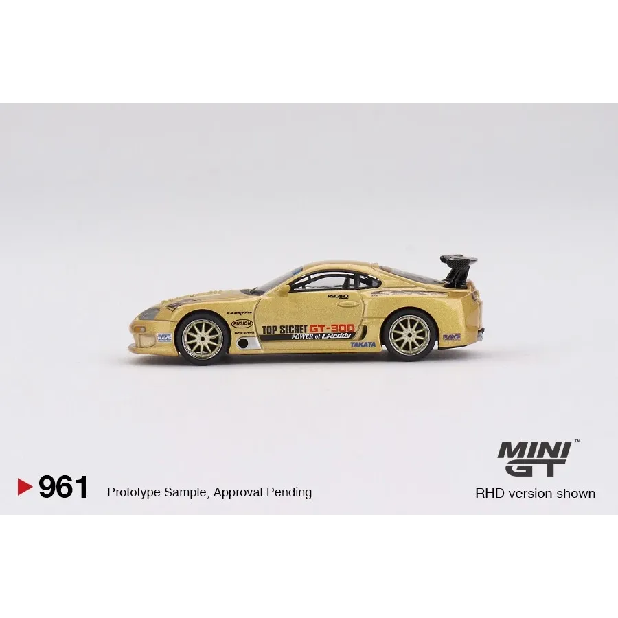 MiniGT 1:64 Toyota Supra A80 Top Secret GT-300 Gold die-cast model featuring ultra-wide JGTC-inspired bodywork.
