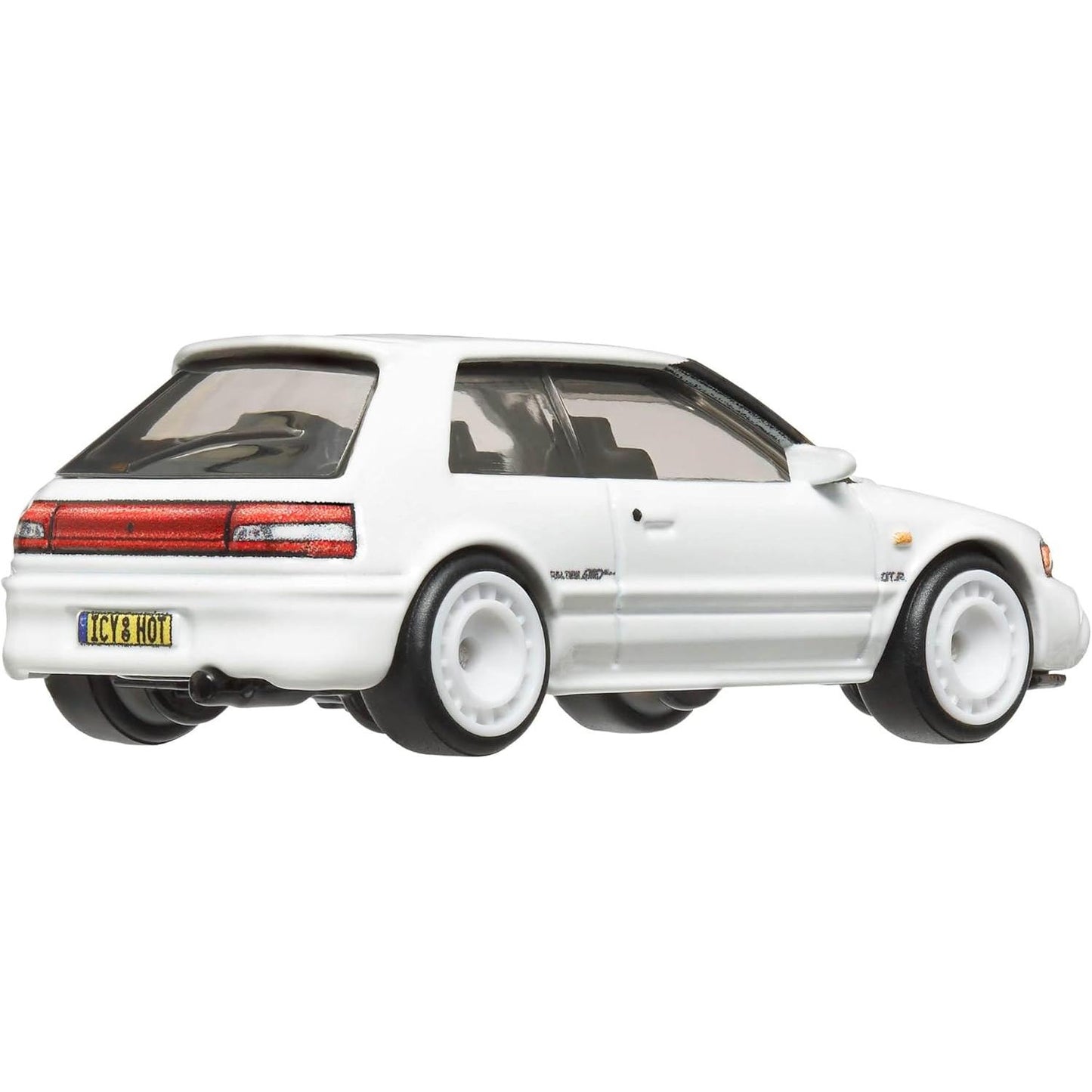 Hot Wheels Boulevard Premium 1:64 Mazda 323 GTR in white with Real Riders tires and ICY HOT license plate.