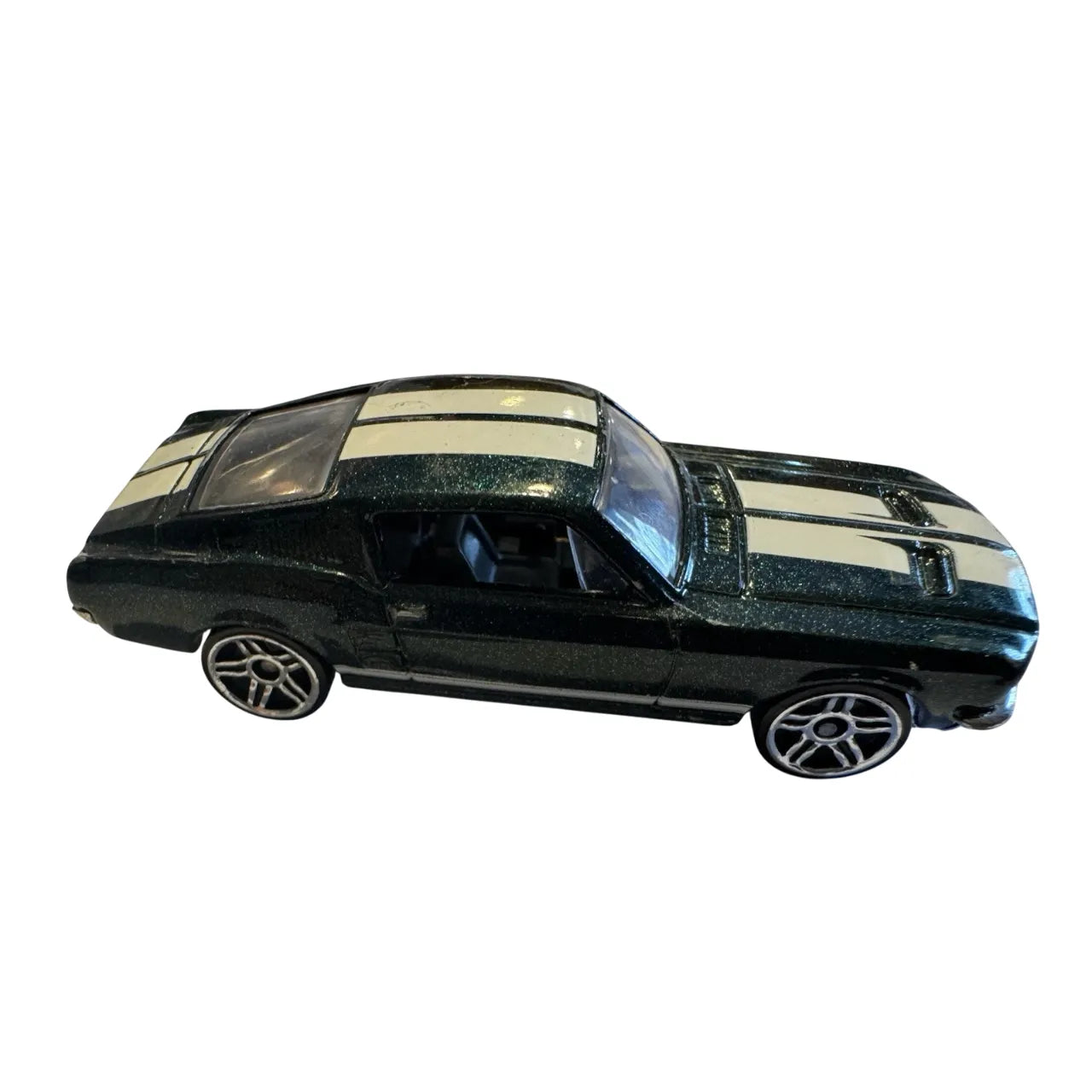 Hot Wheels 1:64 scale die-cast model of the 1967 Ford Mustang driven by Sean Boswell in Fast & Furious: Tokyo Drift, featuring iconic race-modified styling and drift-ready design.