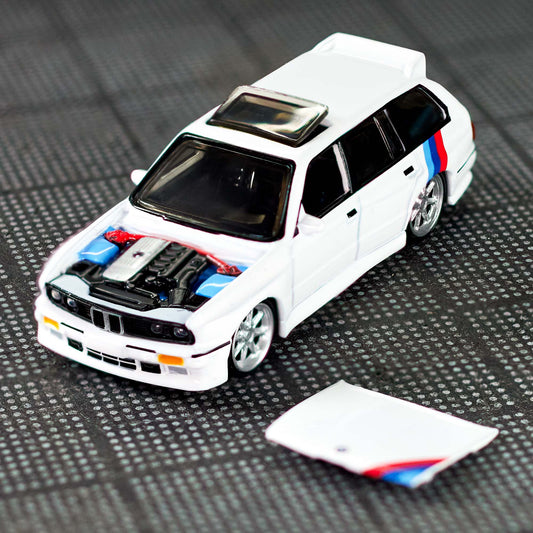Hot Wheels Elite 64 die-cast model of the 1990 BMW 318i Touring with S54 swap and custom racing details.