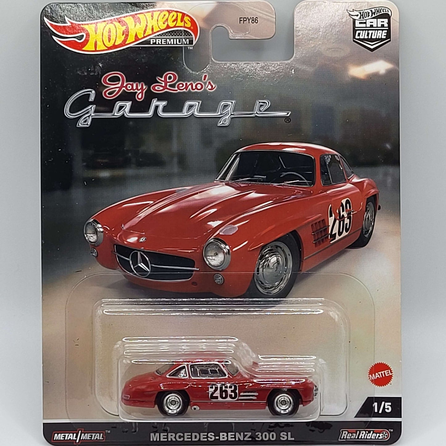 Hot Wheels Mercedes-Benz 300 SL in silver with iconic gullwing doors, part of the Real Riders Jay Leno's Garage series