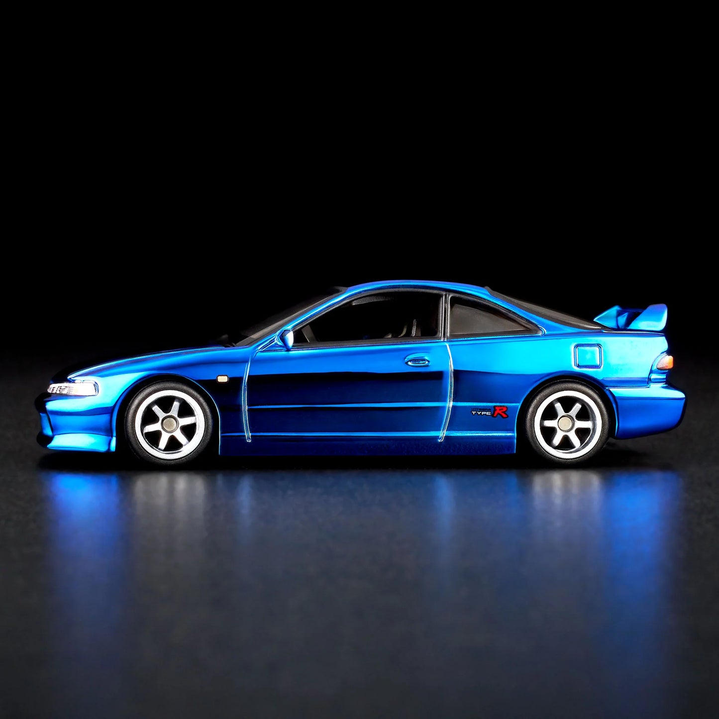 1:64 scale Hot Wheels RLC Exclusive 1995 Honda Integra Type R in Spectraflame OTTO Blue with hood open, showing detailed engine bay and Real Riders wheels. Includes RLC patch and button.