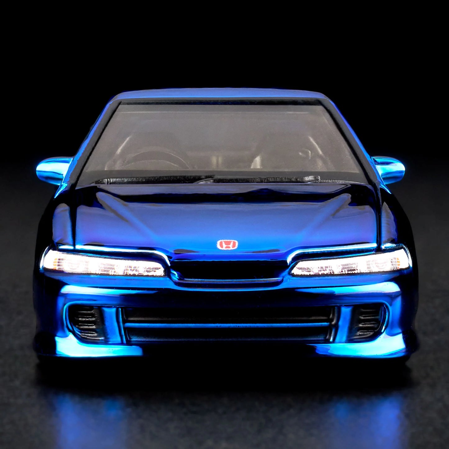 1:64 scale Hot Wheels RLC Exclusive 1995 Honda Integra Type R in Spectraflame OTTO Blue with hood open, showing detailed engine bay and Real Riders wheels. Includes RLC patch and button.