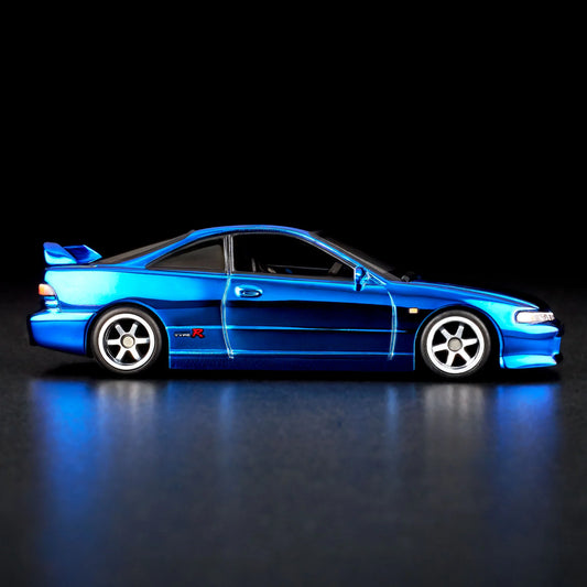 1:64 scale Hot Wheels RLC Exclusive 1995 Honda Integra Type R in Spectraflame OTTO Blue with hood open, showing detailed engine bay and Real Riders wheels. Includes RLC patch and button.