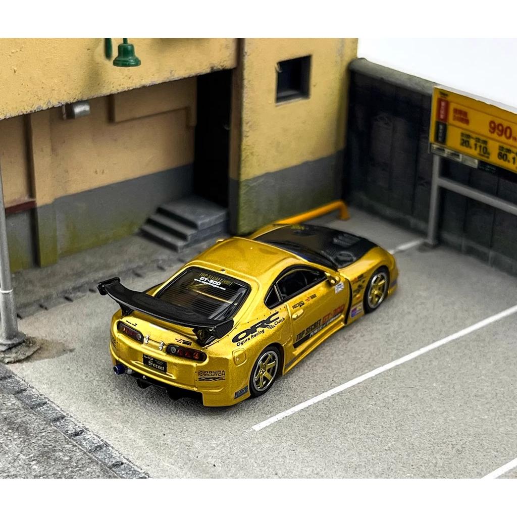 INNO64 1:64 scale die-cast Toyota Supra A80 GT300 in gold, tuned by Top Secret, model IN64-A80TS-GOLD.
