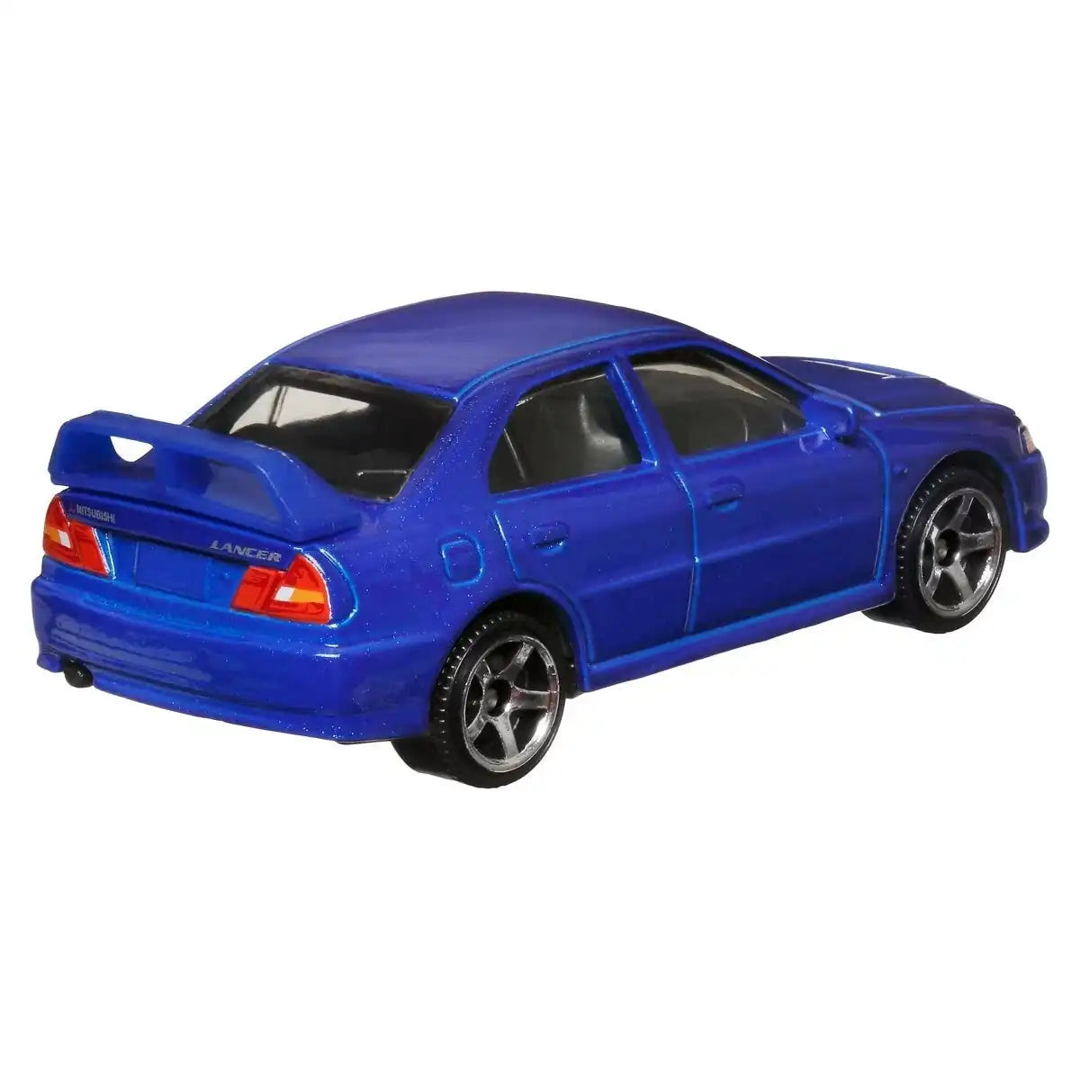 Matchbox 1:64 scale Moving Parts die-cast model of the 1996 Mitsubishi Lancer Evolution IV in metallic blue with opening hood.