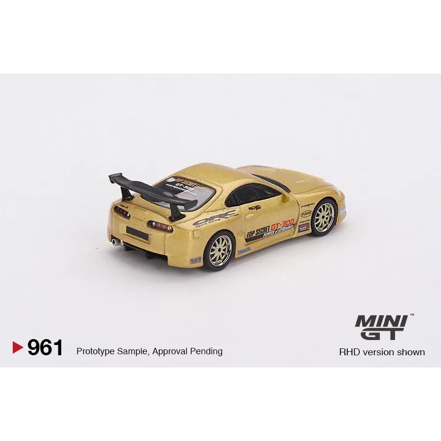 MiniGT 1:64 Toyota Supra A80 Top Secret GT-300 Gold die-cast model featuring ultra-wide JGTC-inspired bodywork.