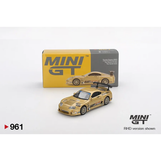 MiniGT 1:64 Toyota Supra A80 Top Secret GT-300 Gold die-cast model featuring ultra-wide JGTC-inspired bodywork.
