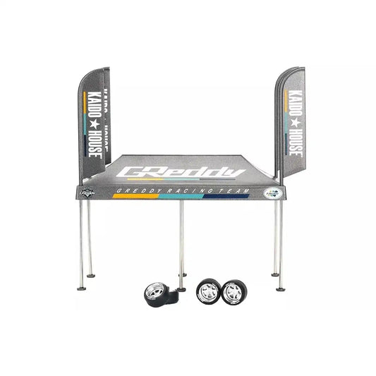 MiniGT Kaido House GReddy V1 Paddock Service Tent Set with Kaido House branding and bonus wheels, scale accessory for die-cast displays.
