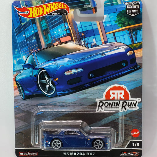 Hot Wheels '95 Mazda RX-7 in red with detailed graphics, part of the Premium Real Riders Ronin Run series