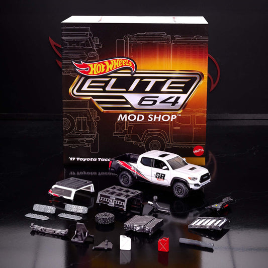 Hot Wheels Elite 64 Mod Shop die-cast 2017 Toyota Tacoma in solid gloss white with off-road accessories, model HNJ64.