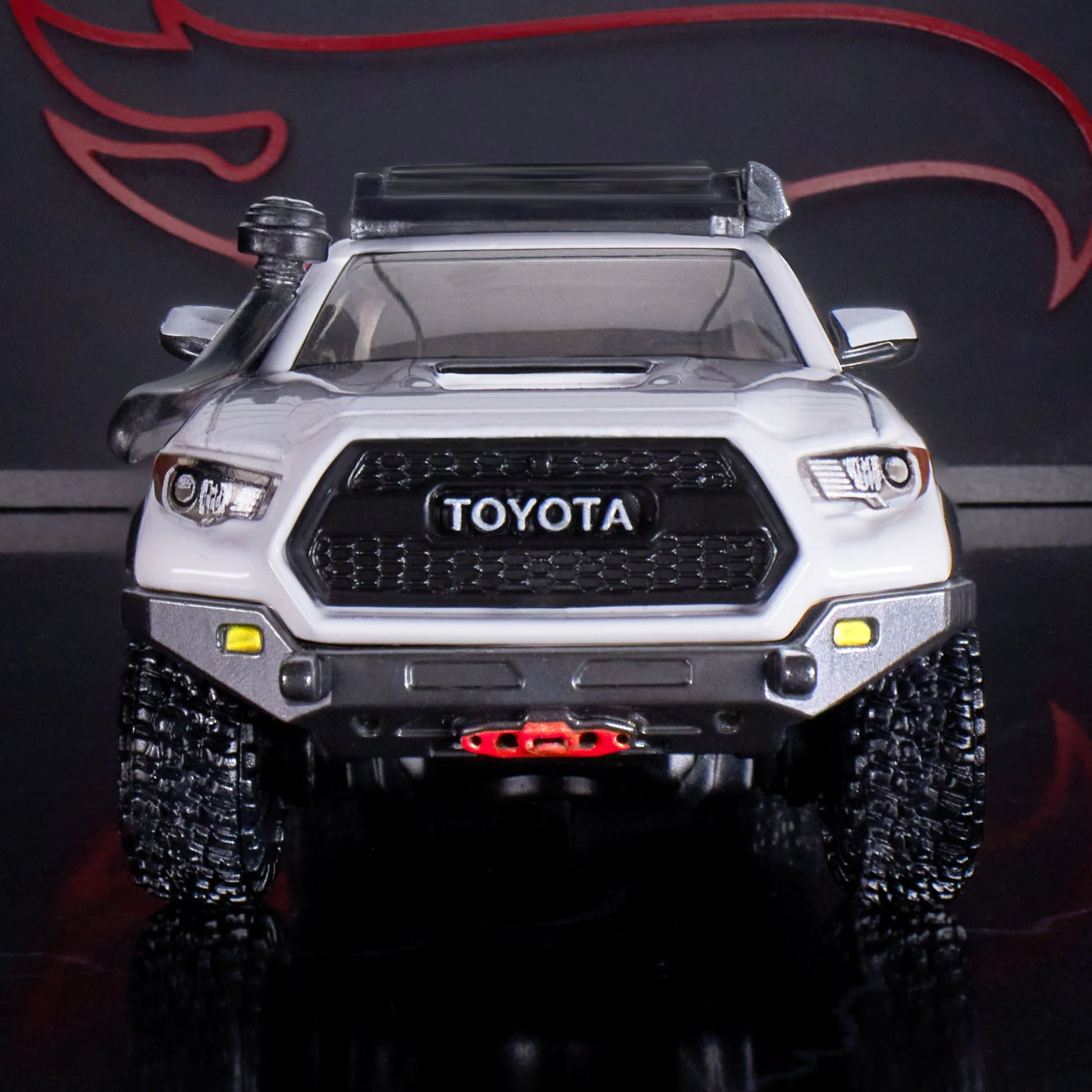 Hot Wheels Elite 64 Mod Shop die-cast 2017 Toyota Tacoma in solid gloss white with off-road accessories, model HNJ64.