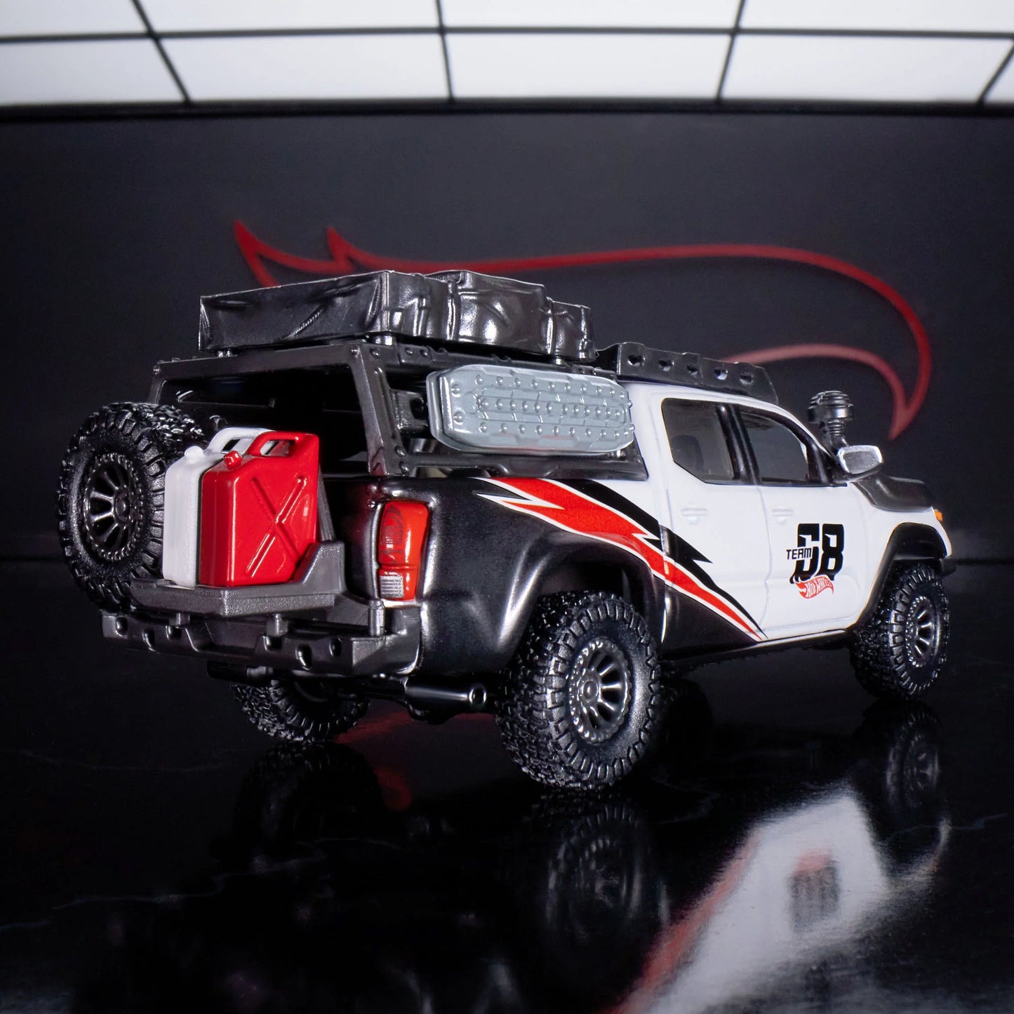 Hot Wheels Elite 64 Mod Shop die-cast 2017 Toyota Tacoma in solid gloss white with off-road accessories, model HNJ64.
