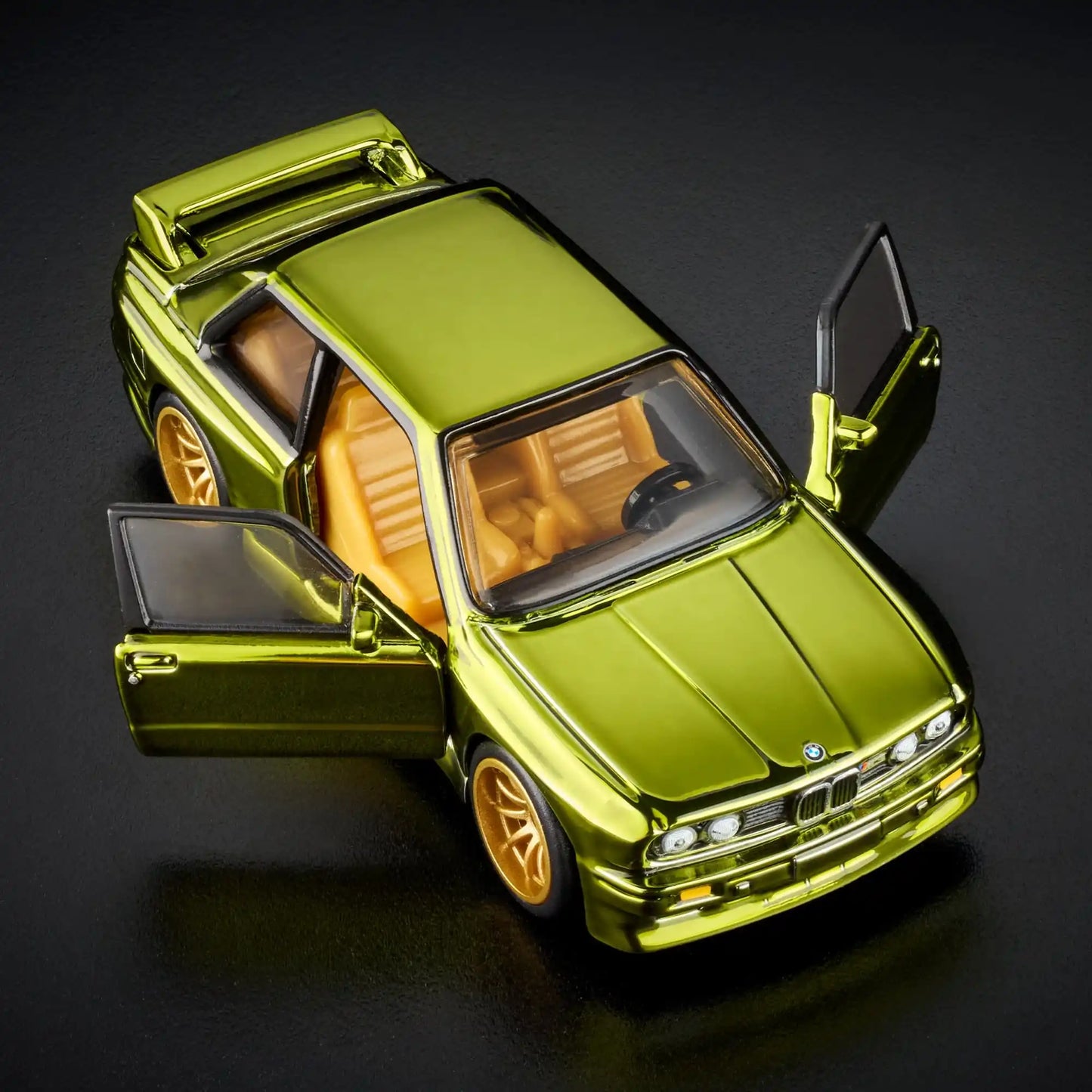 Hot Wheels RLC Exclusive 1991 BMW M3 in Spectraflame Olive with Real Riders gold 10-spoke wheels and opening doors.