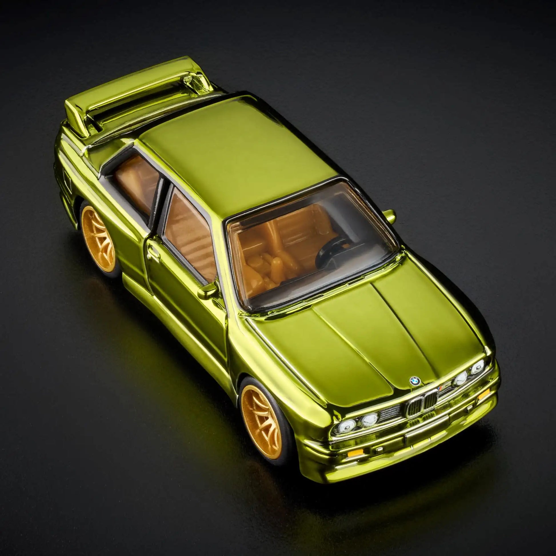 Hot Wheels RLC Exclusive 1991 BMW M3 in Spectraflame Olive with Real Riders gold 10-spoke wheels and opening doors.