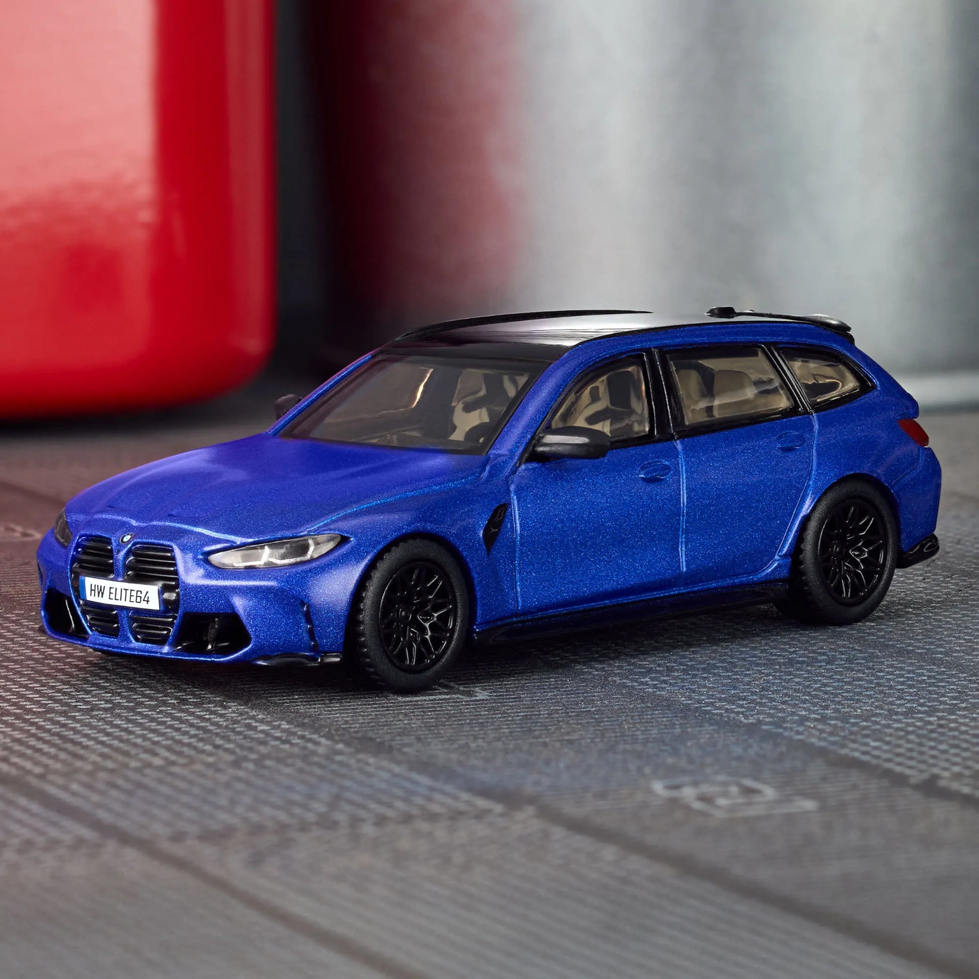 Hot Wheels Elite 64 BMW M3 Touring 1:64 scale die-cast model in Frozen Portimao Blue with Real Riders wheels