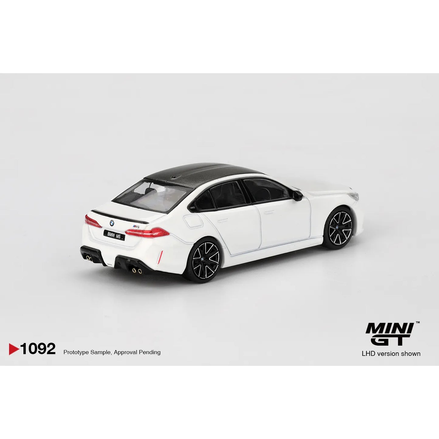 Mini GT 1:64 BMW M5 G90 Alpine White 2025 die-cast model car.
