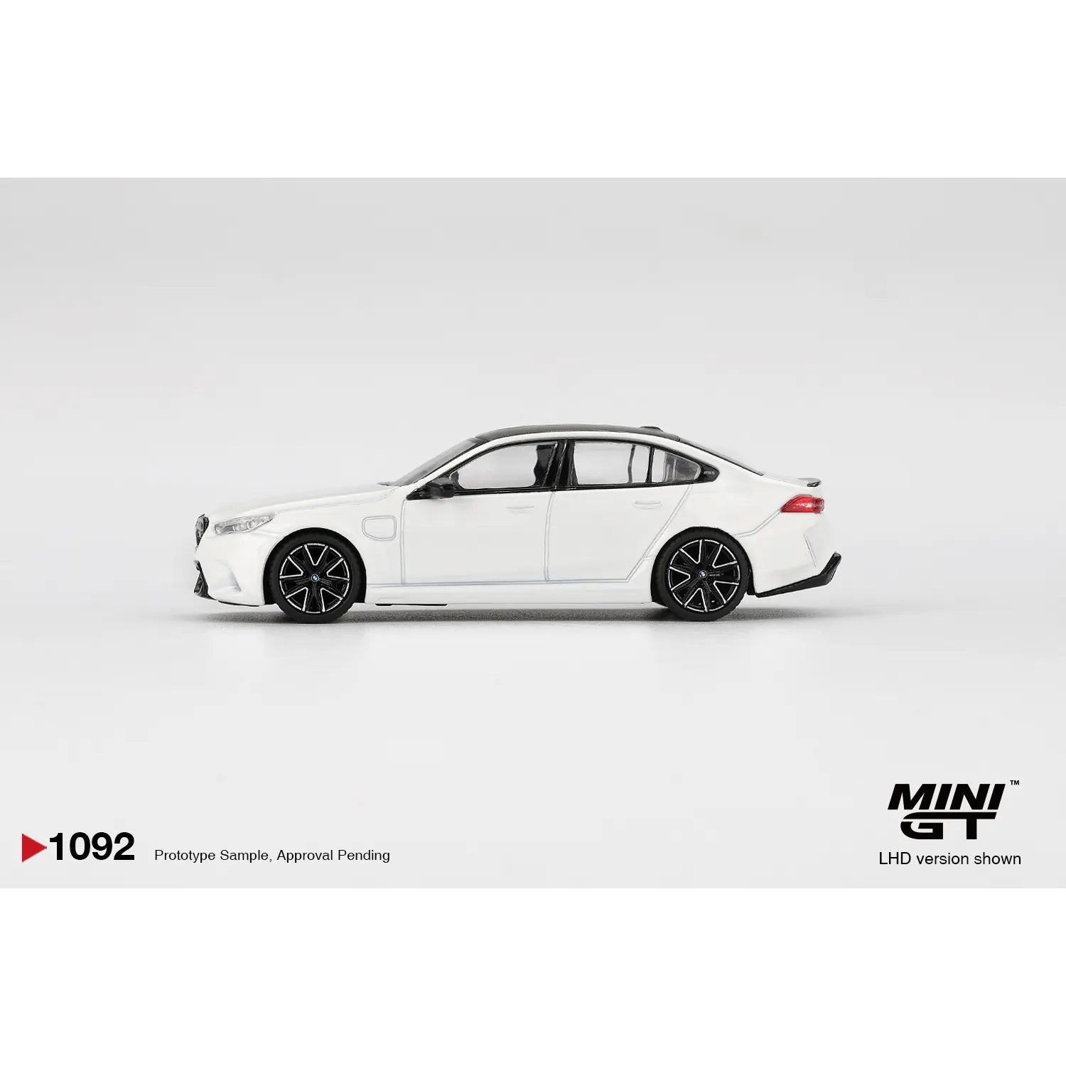 Mini GT 1:64 BMW M5 G90 Alpine White 2025 die-cast model car.