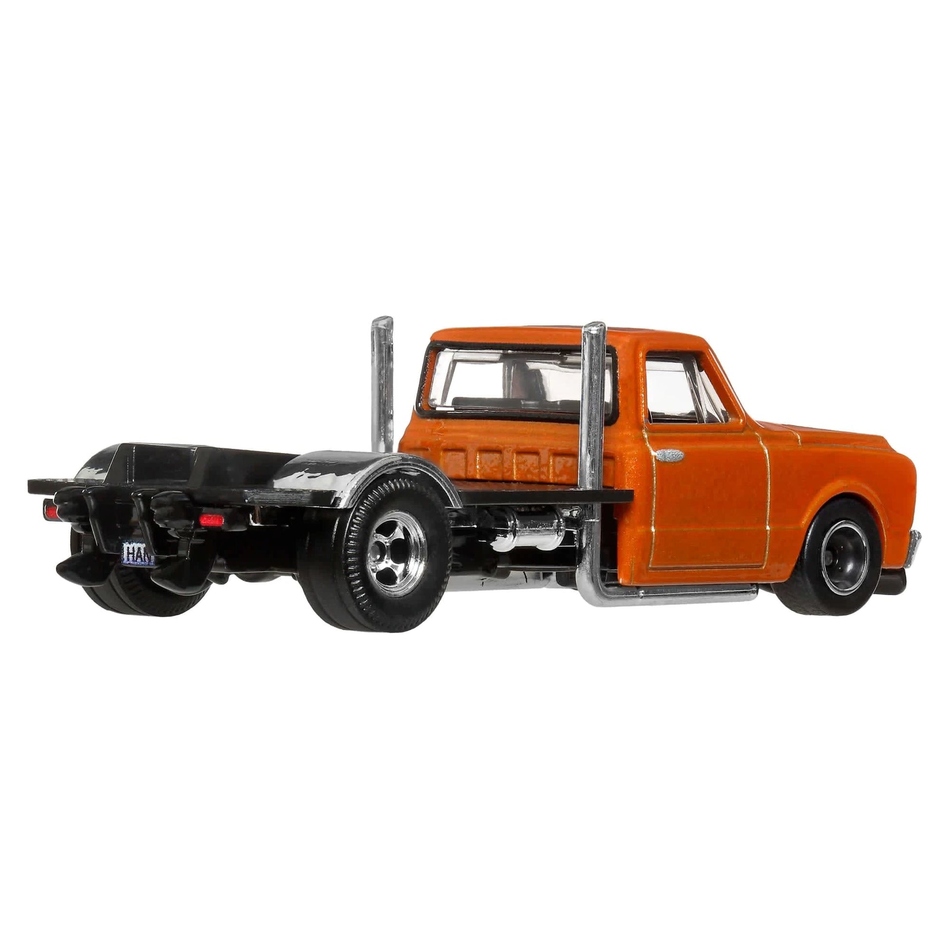 Hot Wheels 1:64 scale 1967 Chevy Custom C-10 Fast & Furious premium die-cast truck with Real Riders wheels.