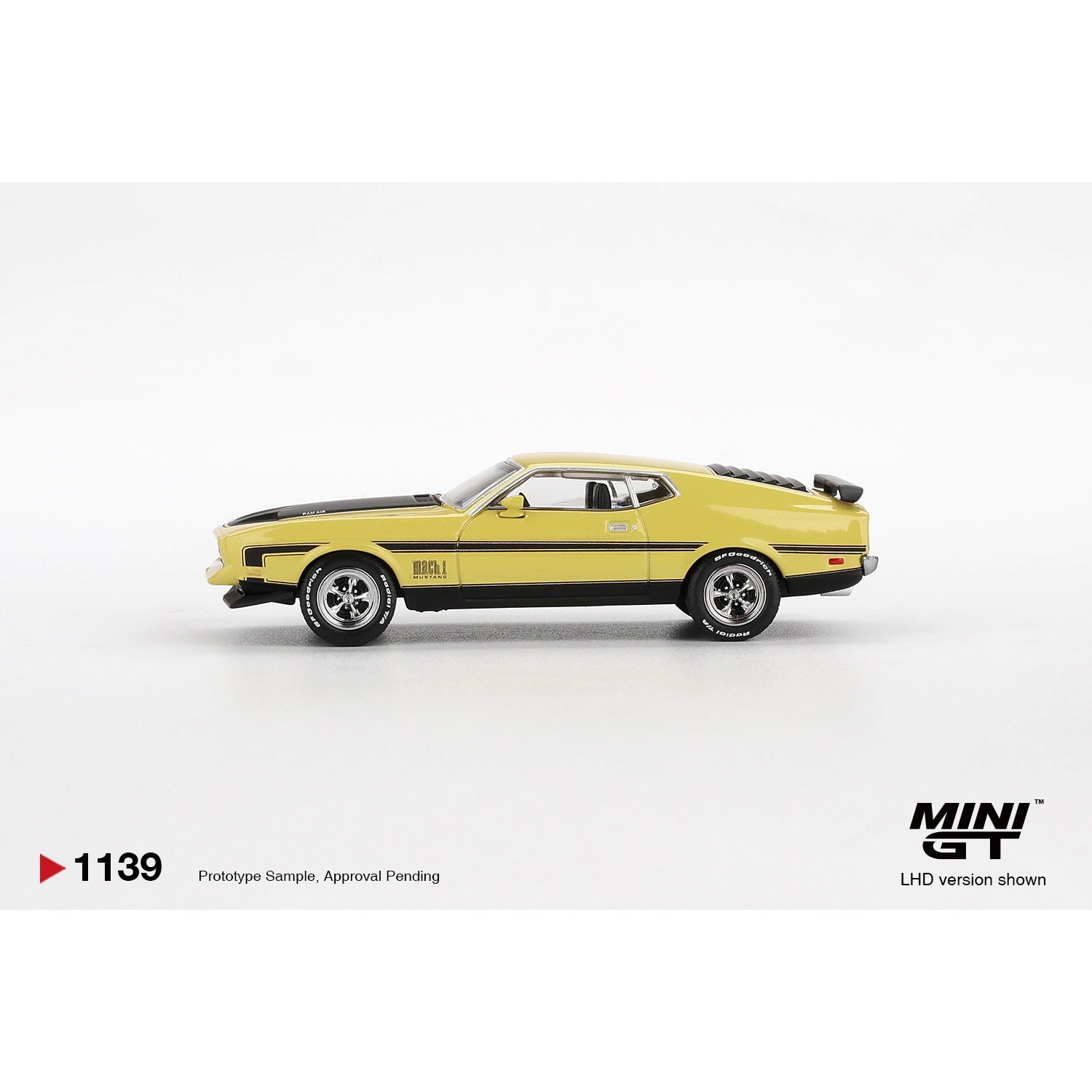 Mini GT 1:64 scale die-cast model of the Ford Mustang Mach 1 in Grabber Yellow with detailed Mach 1 trim, modern muscle styling, and authentic Ford design elements