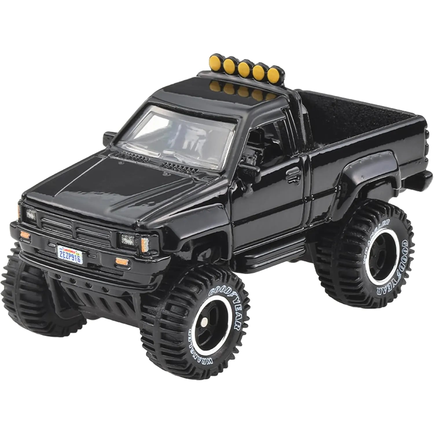Hot Wheels Premium Car Culture 2-Pack featuring the Back to the Future Time Machine and 1987 Toyota Pickup Truck die-cast collectible models with premium detailing.