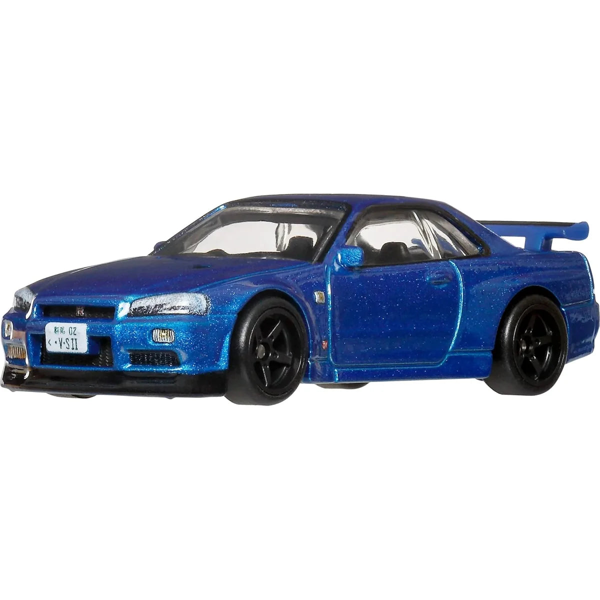 Hot Wheels Premium Car Culture Timeless Icons 1:64 Nissan Skyline GT-R V-Spec II BNR34 metallic blue die-cast with Real Riders tires.