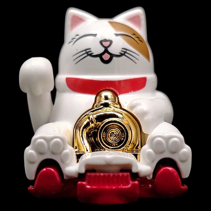 Hot Wheels 1:64 Feline Lucky die-cast car from the Celebration Racers series featuring a lucky cat design with gold accents.