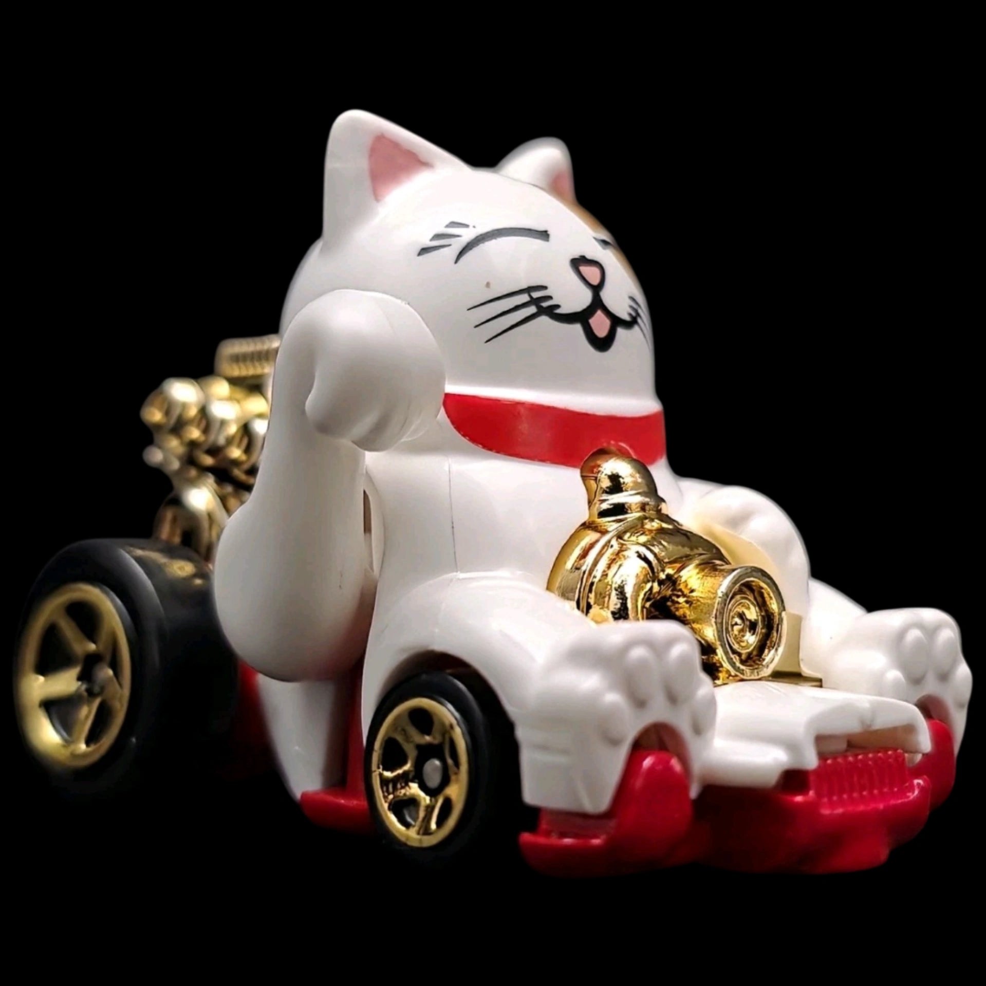 Hot Wheels 1:64 Feline Lucky die-cast car from the Celebration Racers series featuring a lucky cat design with gold accents.