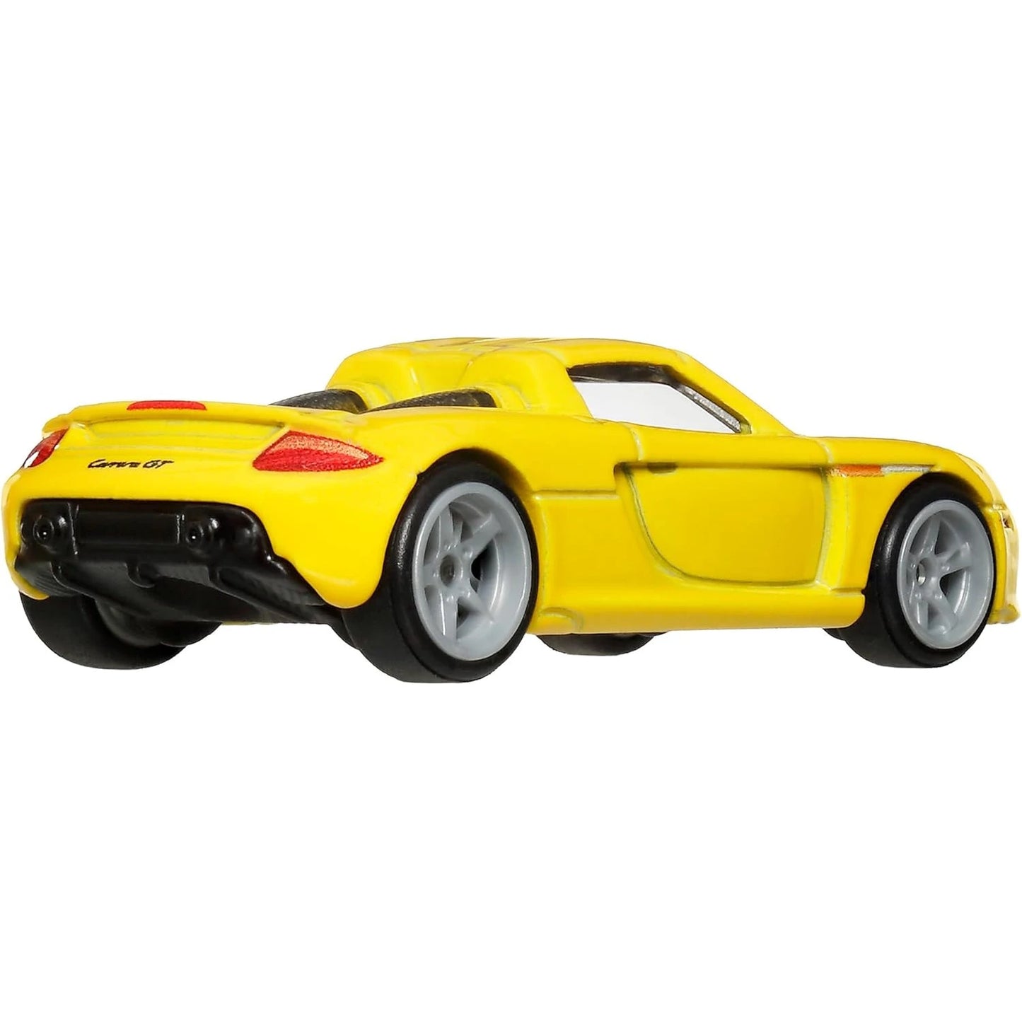 Hot Wheels 1:64 Porsche Carrera GT yellow Car Culture Timeless Icons die-cast model with Real Riders wheels.