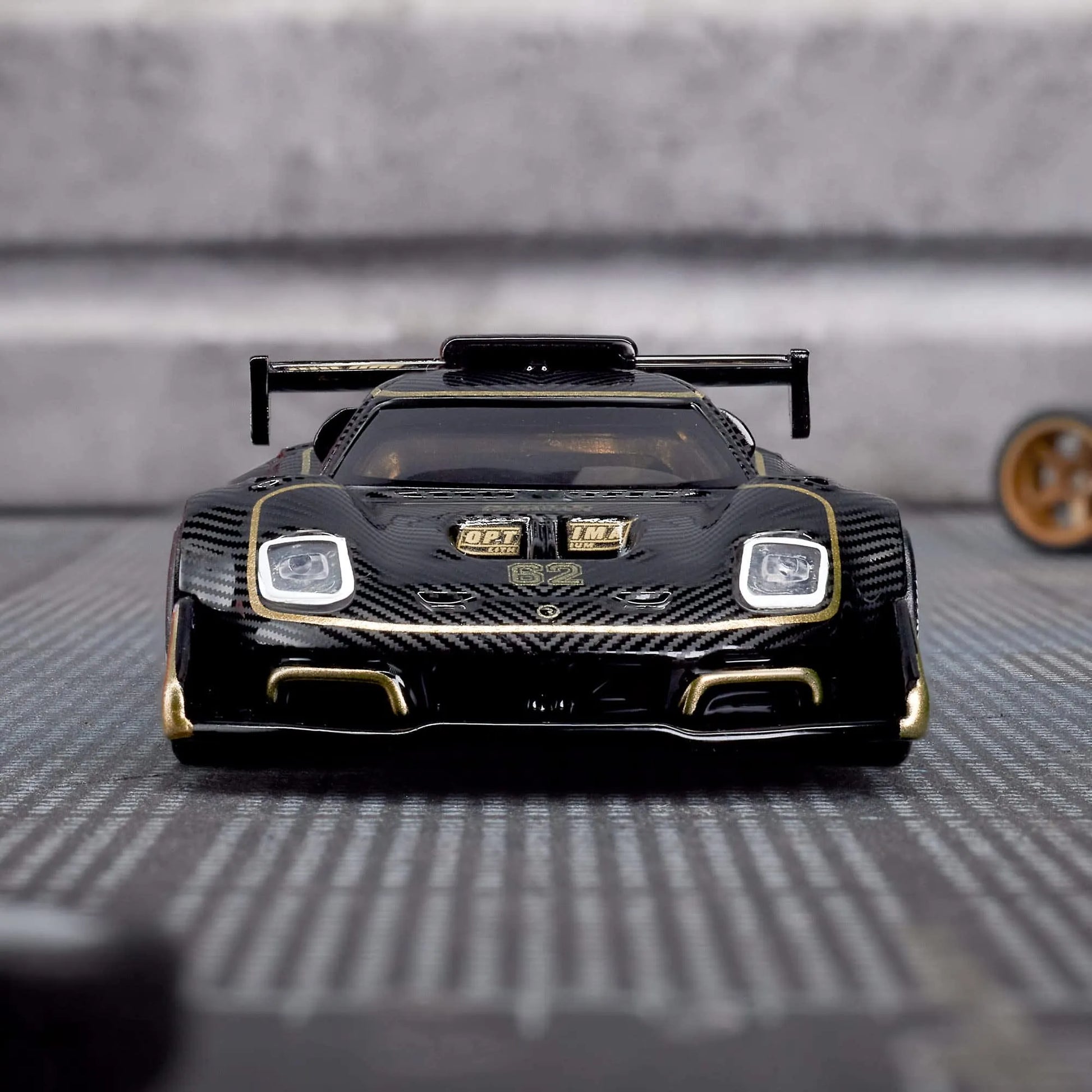 Hot Wheels Elite 64 Radford Type 62-2 Pikes Peak die-cast model with Real Riders wheels and black ZAMAC body.