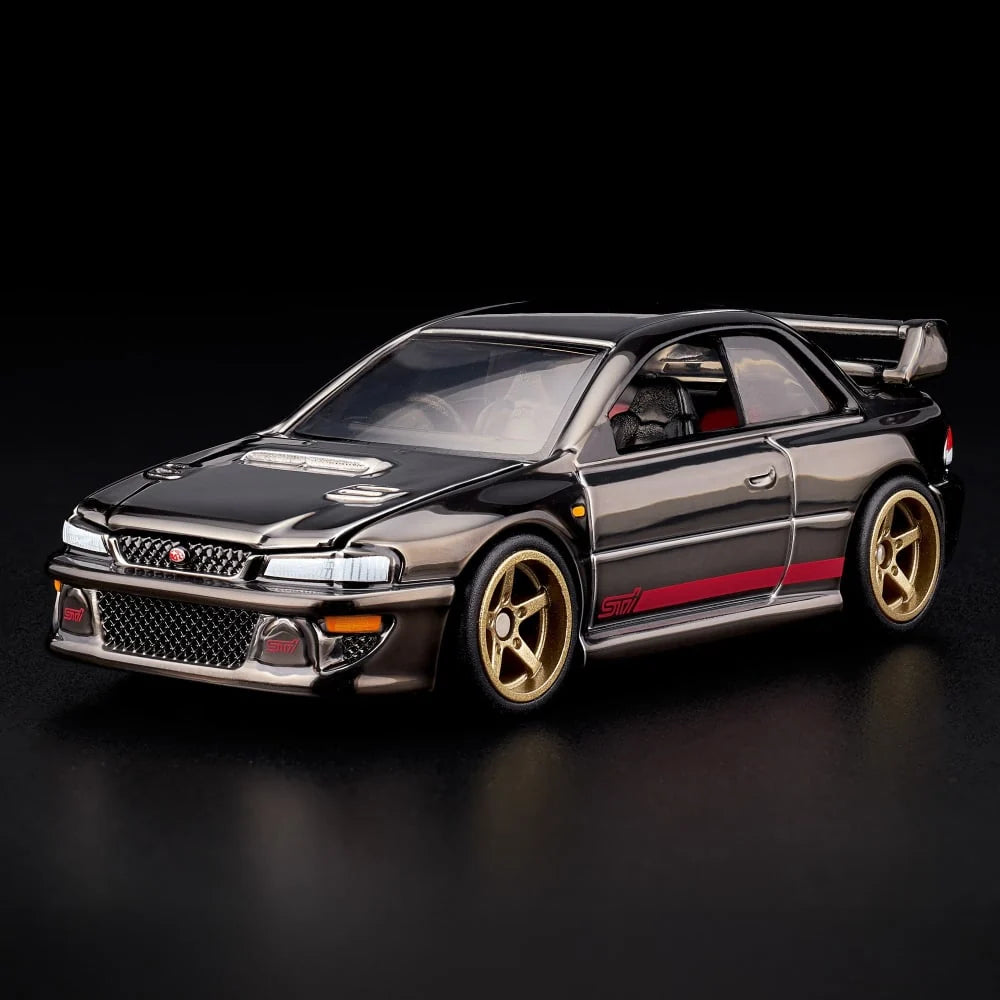 Hot Wheels RLC Exclusive 1998 Subaru Impreza WRX STi 1:64 JJY62 in Spectraflame Slate with pink STi stripes and bronze Real Riders wheels