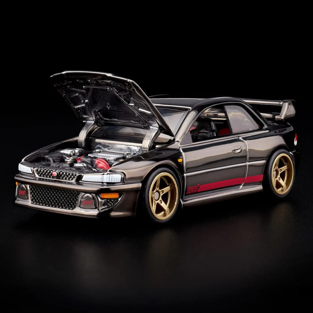 Hot Wheels RLC Exclusive 1998 Subaru Impreza WRX STi 1:64 JJY62 in Spectraflame Slate with pink STi stripes and bronze Real Riders wheels