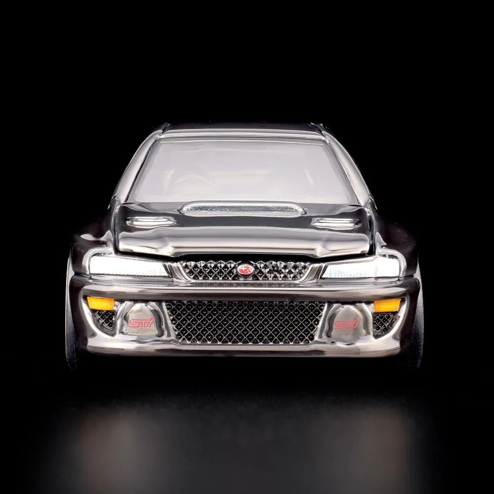 Hot Wheels RLC Exclusive 1998 Subaru Impreza WRX STi 1:64 JJY62 in Spectraflame Slate with pink STi stripes and bronze Real Riders wheels