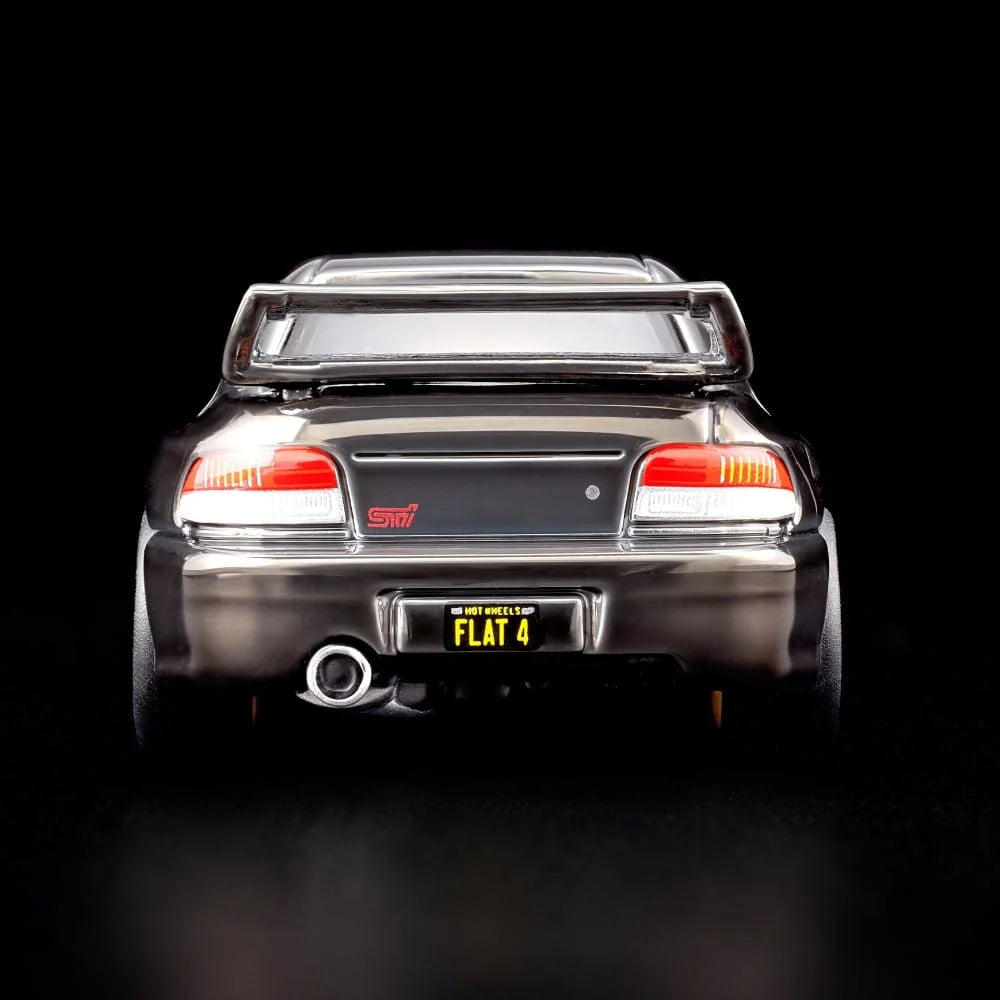 Hot Wheels RLC Exclusive 1998 Subaru Impreza WRX STi 1:64 JJY62 in Spectraflame Slate with pink STi stripes and bronze Real Riders wheels