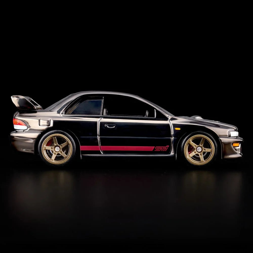 Hot Wheels RLC Exclusive 1998 Subaru Impreza WRX STi 1:64 JJY62 in Spectraflame Slate with pink STi stripes and bronze Real Riders wheels