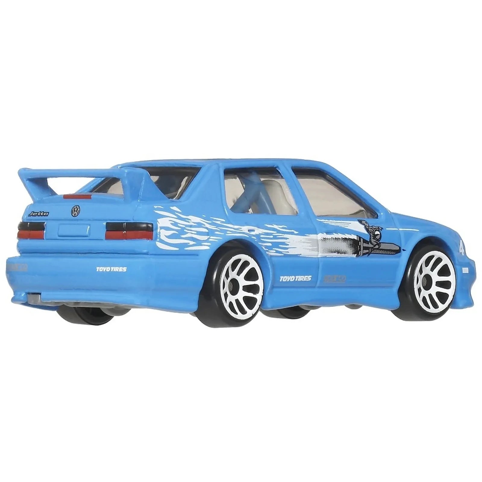 Hot Wheels 1995 Volkswagen Jetta A3 Jesse The Fast and the Furious die-cast car on Fast & Furious Graphic Remix Silver Series card (3/5), blue Volkswagen Jetta.
