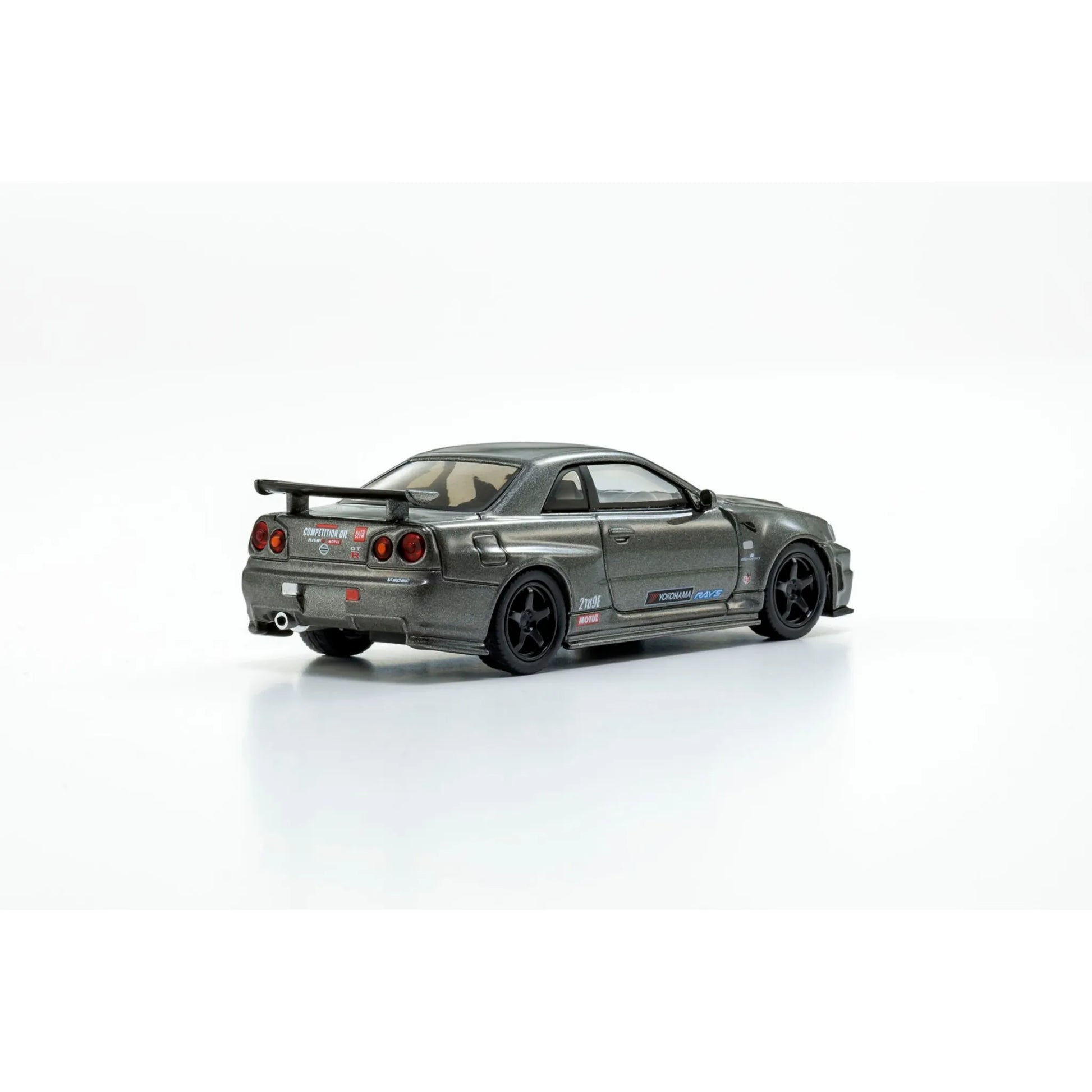 Kyosho 1:64 Nissan Skyline GT-R R34 NISMO BNR34 CRS Version Gray die-cast collectible model.