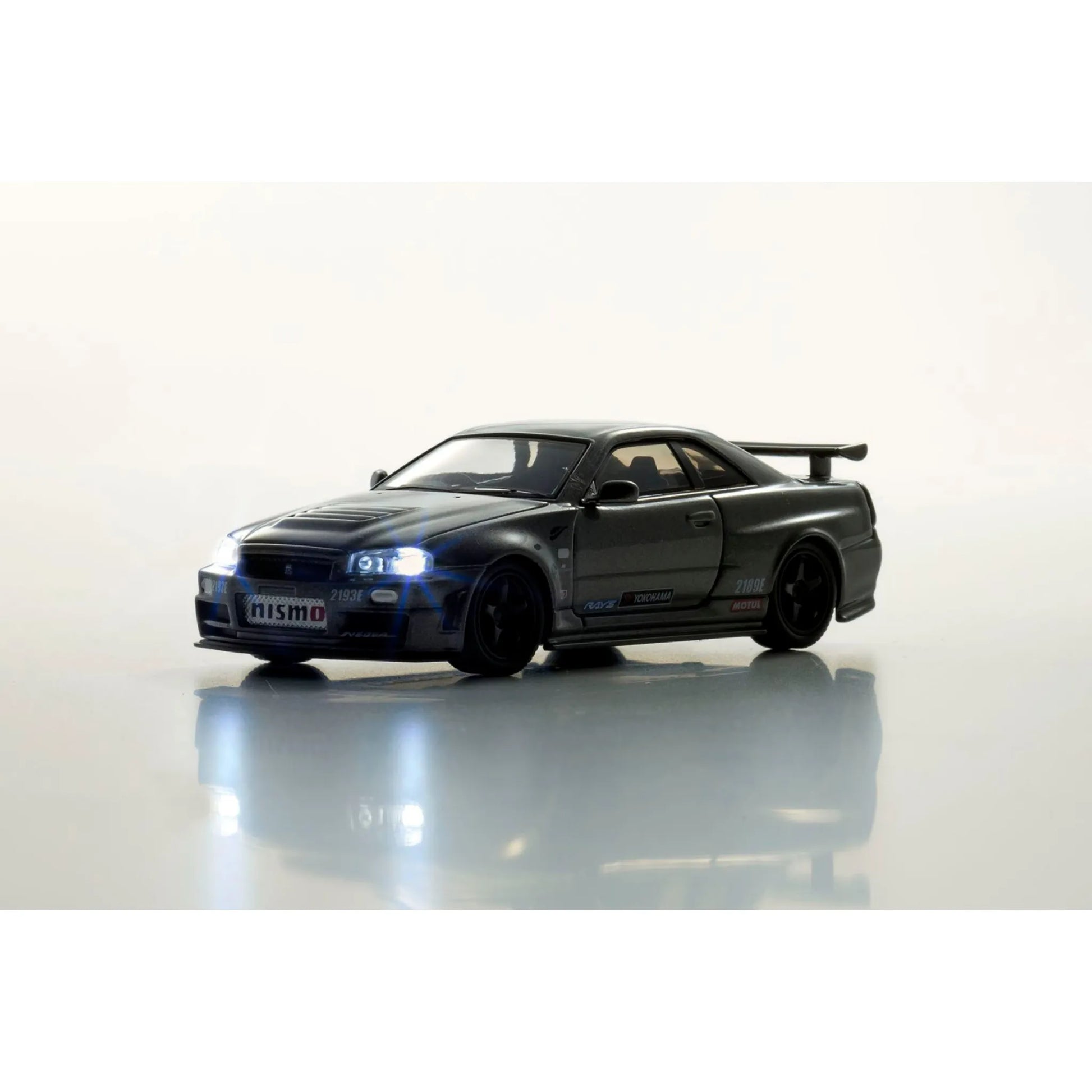 Kyosho 1:64 Nissan Skyline GT-R R34 NISMO BNR34 CRS Version Gray die-cast collectible model.