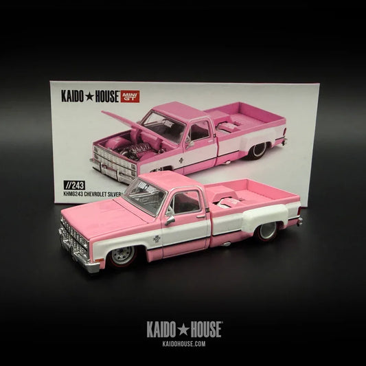 Kaido House x Mini GT Chevrolet Silverado Dually Vintage Spec V2 KHMG243 in pale pink metallic.