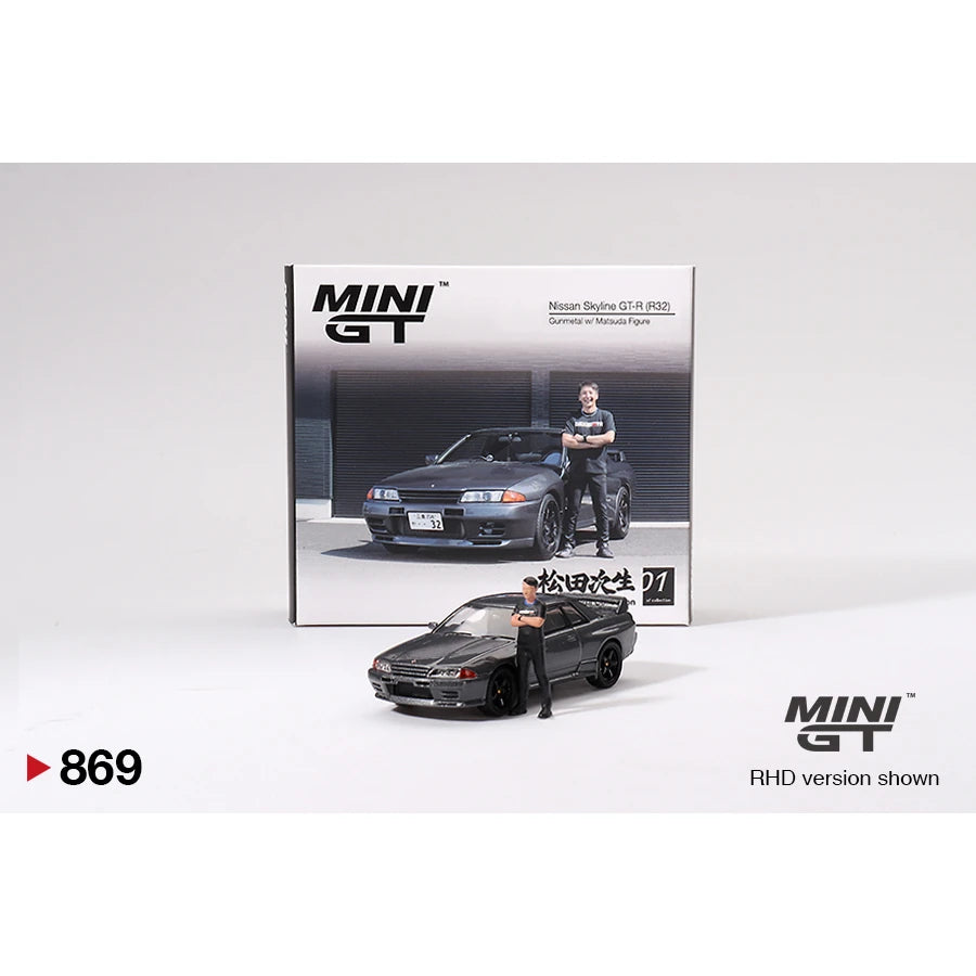 MiniGT 1:64 scale die-cast Nissan Skyline GT-R R32 in Gunmetal with Matsuda figure – model #869