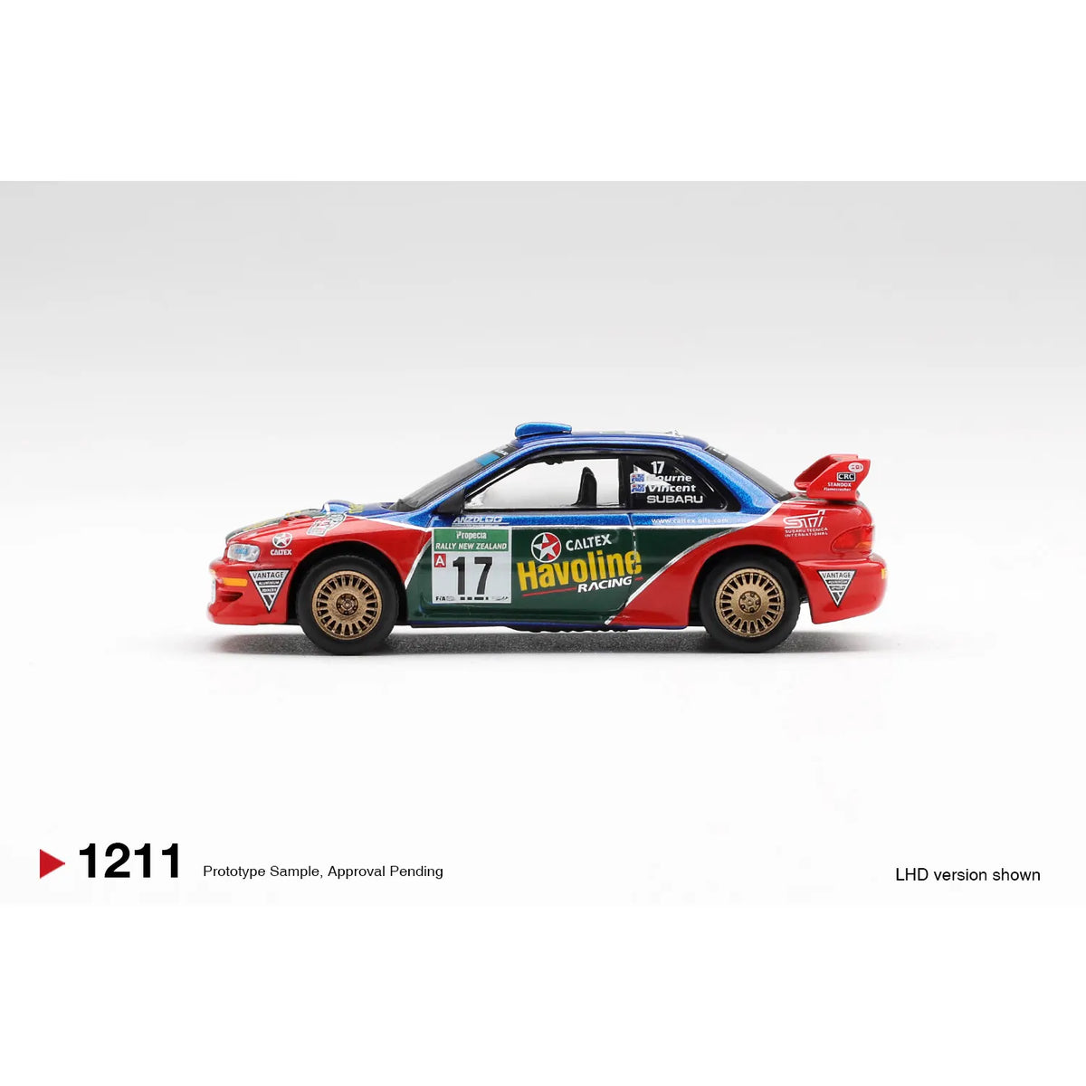 Mini GT 1:64 Subaru Impreza WRC98 #17 Rally New Zealand 2000 Havoline Racing diecast model with gold wheels MGT01211-L