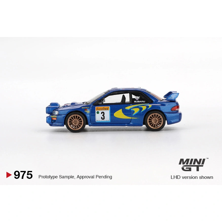 MiniGT 1:64 die-cast Subaru Impreza WRC98 #3 in blue and yellow 1998 Rally Monte Carlo livery with roof rally lights and gold wheels.