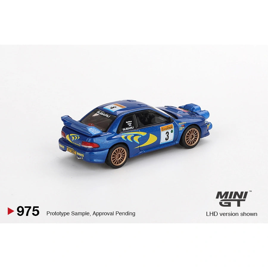 MiniGT 1:64 die-cast Subaru Impreza WRC98 #3 in blue and yellow 1998 Rally Monte Carlo livery with roof rally lights and gold wheels.