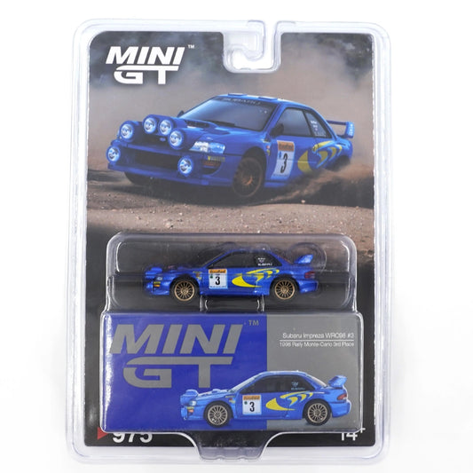 MiniGT 1:64 die-cast Subaru Impreza WRC98 #3 in blue and yellow 1998 Rally Monte Carlo livery with roof rally lights and gold wheels.