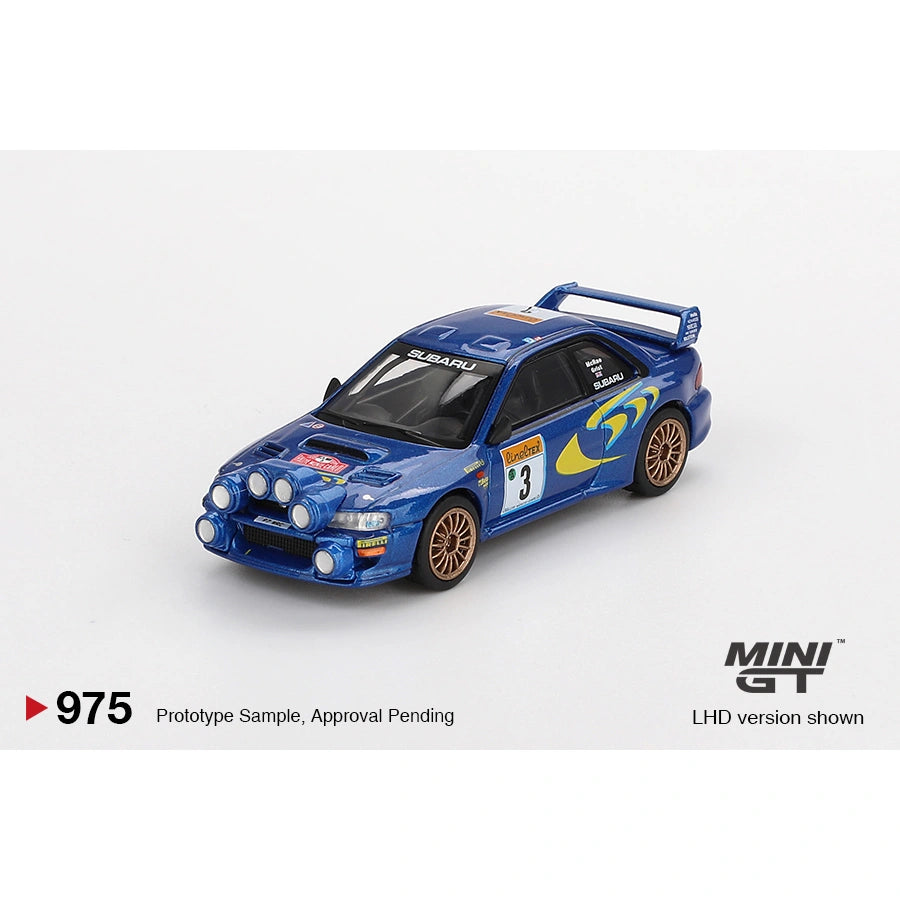 MiniGT 1:64 die-cast Subaru Impreza WRC98 #3 in blue and yellow 1998 Rally Monte Carlo livery with roof rally lights and gold wheels.