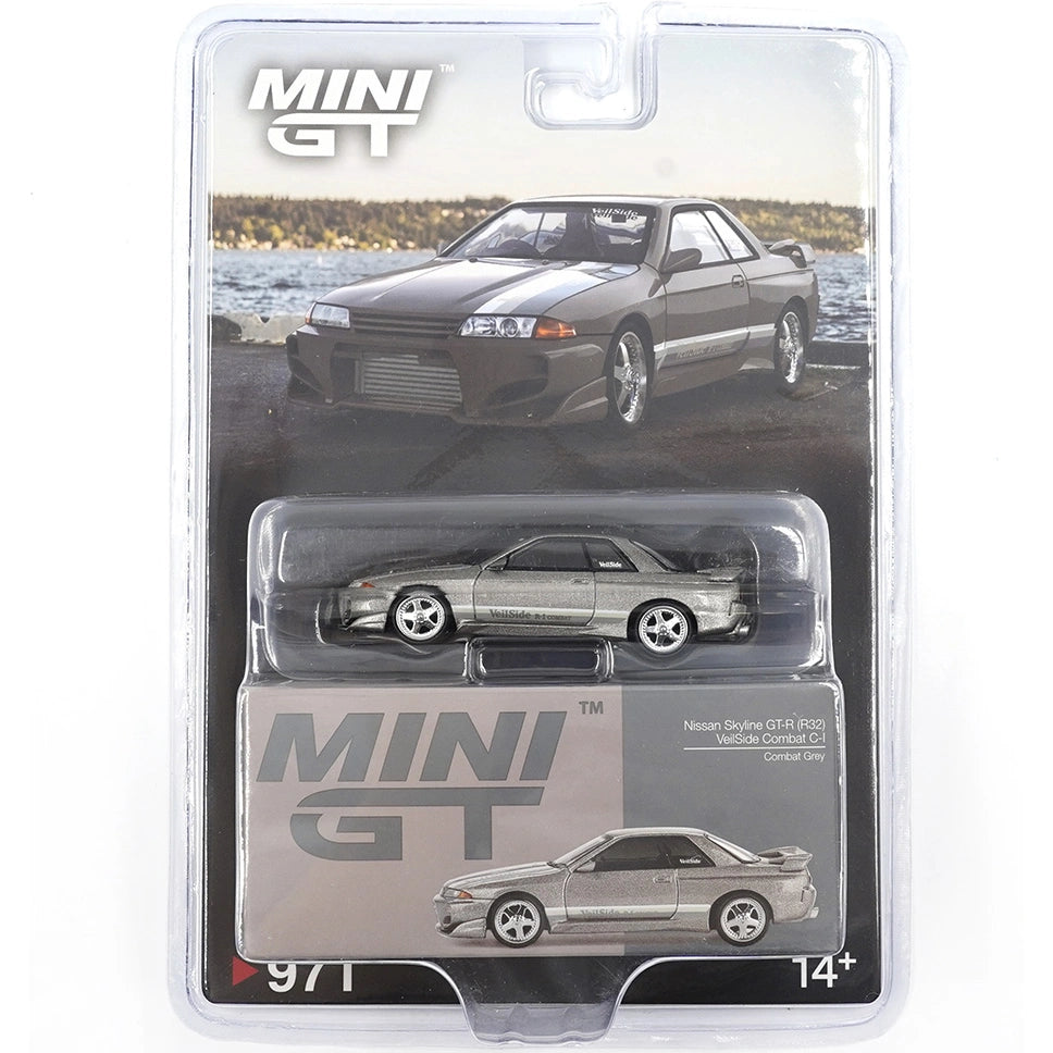 MINI GT 1:64 Nissan Skyline GT-R (R32) VeilSide Combat C-I in Combat Grey — product images showing left profile, three-quarter front and retail blister packaging (product #971).