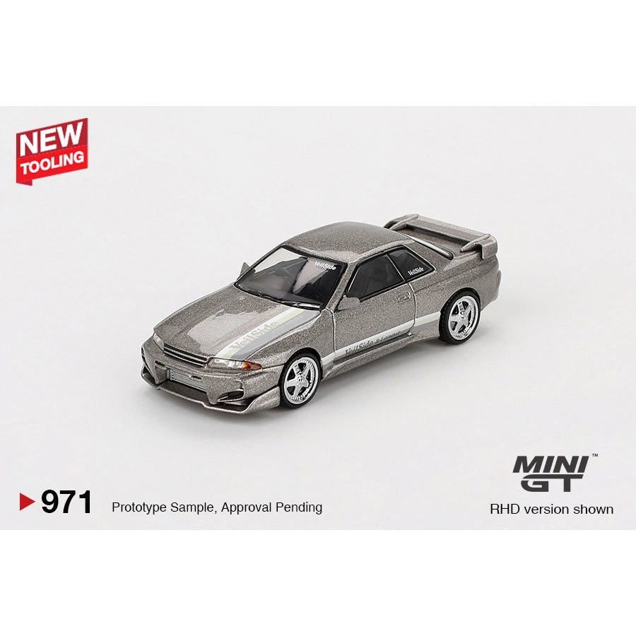 MINI GT 1:64 Nissan Skyline GT-R (R32) VeilSide Combat C-I in Combat Grey — product images showing left profile, three-quarter front and retail blister packaging (product #971).