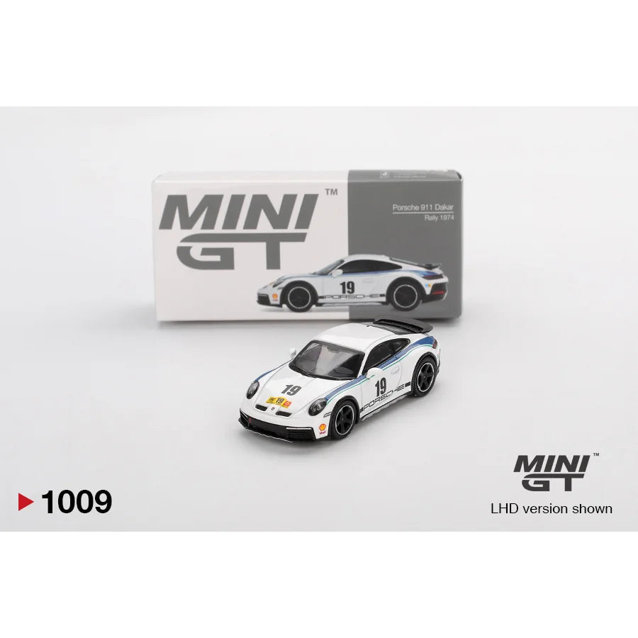 Mini GT 1:64 scale Porsche 911 Dakar Rally 1974 White #1009 MGT01009 die-cast model with number 19 rally graphics.