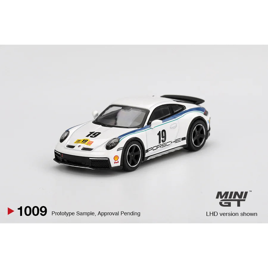 Mini GT 1:64 scale Porsche 911 Dakar Rally 1974 White #1009 MGT01009 die-cast model with number 19 rally graphics.