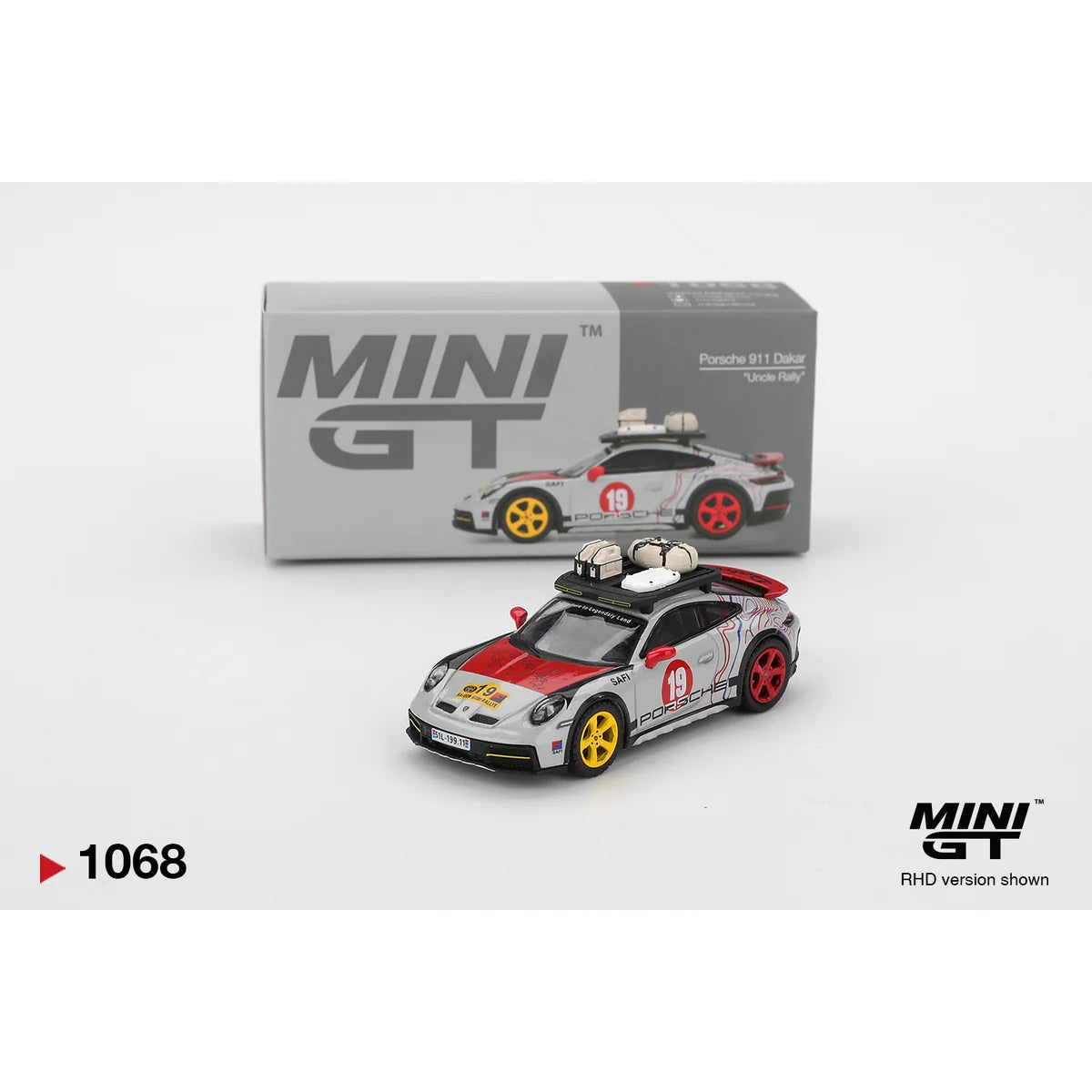 Mini GT 1:64 scale Porsche 911 Dakar Uncle Rally #1068 MGT01068 die-cast model with rally-inspired detailing.